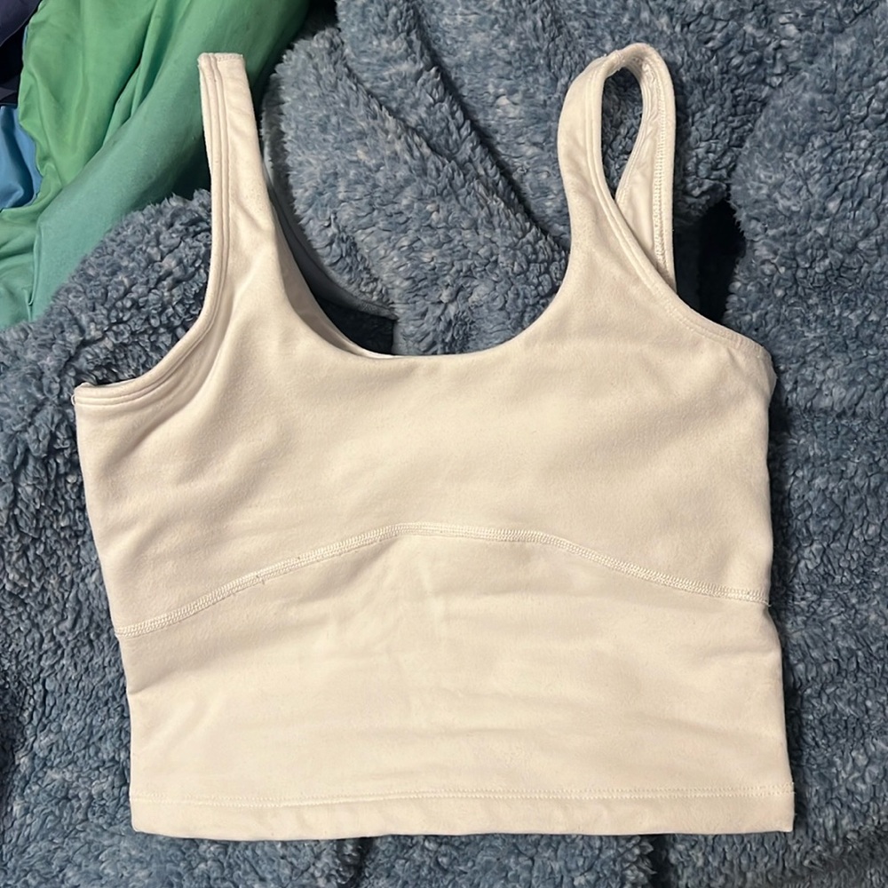 TNA action tank with built in bra.